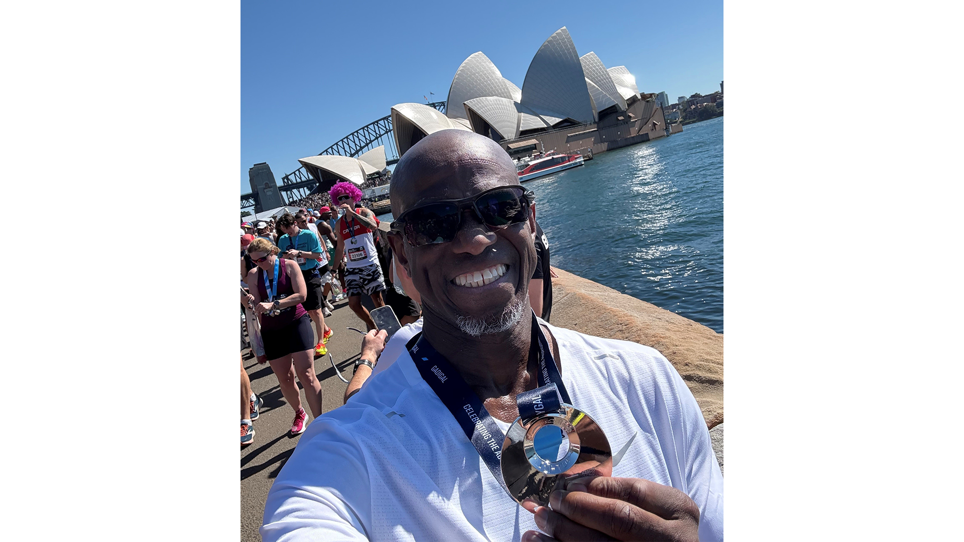 Neville in Sydney with Opera House and Harbour Bridge in the background