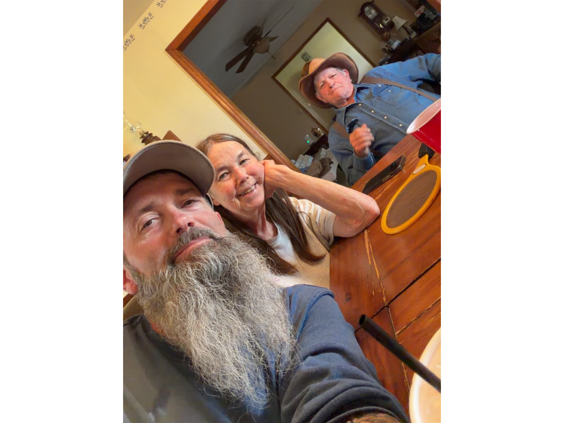 Chris with his mom and dad